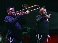 A member of the Los Estramboticos band performs during the ''Hasta Siempre Presidente Fest'' at the Monumento to the Revolution in Mexico Ci...