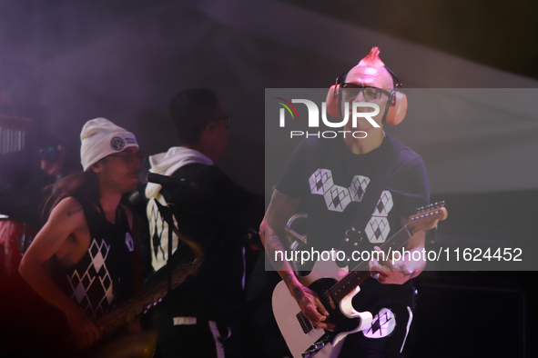 David Sanchez ''Chadou,'' guitarist of the Los Estramboticos band, performs during the ''Hasta Siempre Presidente Fest'' at the Monumento to...