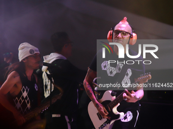 David Sanchez ''Chadou,'' guitarist of the Los Estramboticos band, performs during the ''Hasta Siempre Presidente Fest'' at the Monumento to...