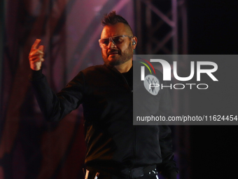 Arturo Ruelas, known as ''Pinocho,'' vocalist of the Los Estramboticos band, performs during the ''Hasta Siempre Presidente Fest'' at the Mo...