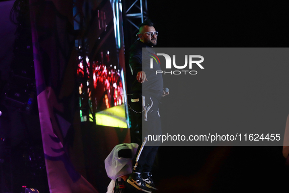 Arturo Ruelas, known as ''Pinocho,'' vocalist of the Los Estramboticos band, performs during the ''Hasta Siempre Presidente Fest'' at the Mo...