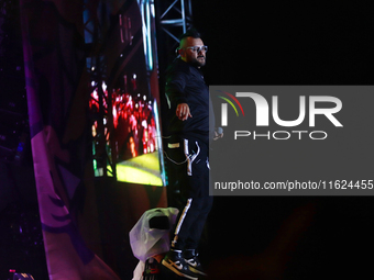 Arturo Ruelas, known as ''Pinocho,'' vocalist of the Los Estramboticos band, performs during the ''Hasta Siempre Presidente Fest'' at the Mo...