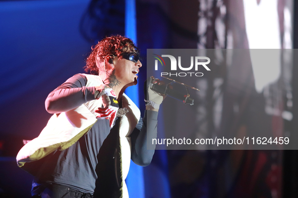 Rapper Erick Raul Aleman Ramirez, known as 'Aleman,' performs during the ''Hasta Siempre Presidente Fest'' at the Monumento to the Revolutio...