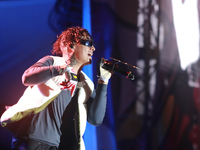 Rapper Erick Raul Aleman Ramirez, known as 'Aleman,' performs during the ''Hasta Siempre Presidente Fest'' at the Monumento to the Revolutio...