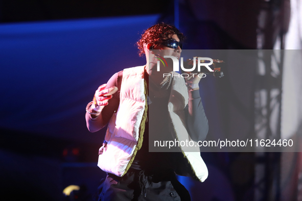 Rapper Erick Raul Aleman Ramirez, known as 'Aleman,' performs during the ''Hasta Siempre Presidente Fest'' at the Monumento to the Revolutio...