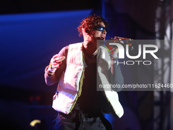 Rapper Erick Raul Aleman Ramirez, known as 'Aleman,' performs during the ''Hasta Siempre Presidente Fest'' at the Monumento to the Revolutio...