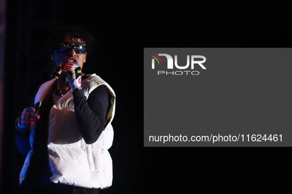 Rapper Erick Raul Aleman Ramirez, known as 'Aleman,' performs during the ''Hasta Siempre Presidente Fest'' at the Monumento to the Revolutio...