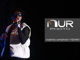 Rapper Erick Raul Aleman Ramirez, known as 'Aleman,' performs during the ''Hasta Siempre Presidente Fest'' at the Monumento to the Revolutio...