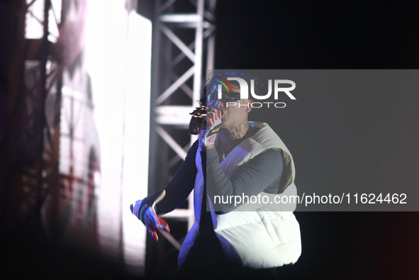 Rapper Erick Raul Aleman Ramirez, known as 'Aleman,' performs during the ''Hasta Siempre Presidente Fest'' at the Monumento to the Revolutio...