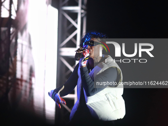 Rapper Erick Raul Aleman Ramirez, known as 'Aleman,' performs during the ''Hasta Siempre Presidente Fest'' at the Monumento to the Revolutio...