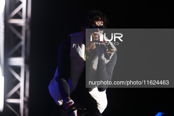 Rapper Erick Raul Aleman Ramirez, known as 'Aleman,' performs during the ''Hasta Siempre Presidente Fest'' at the Monumento to the Revolutio...