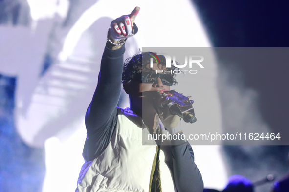 Rapper Erick Raul Aleman Ramirez, known as 'Aleman,' performs during the ''Hasta Siempre Presidente Fest'' at the Monumento to the Revolutio...