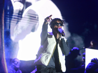 Rapper Erick Raul Aleman Ramirez, known as 'Aleman,' performs during the ''Hasta Siempre Presidente Fest'' at the Monumento to the Revolutio...