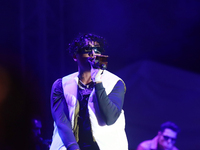 Rapper Erick Raul Aleman Ramirez, known as 'Aleman,' performs during the ''Hasta Siempre Presidente Fest'' at the Monumento to the Revolutio...