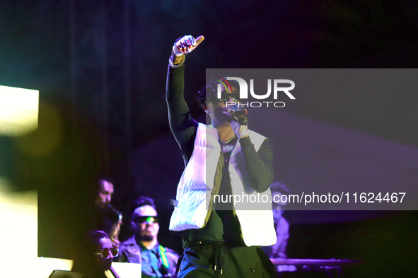 Rapper Erick Raul Aleman Ramirez, known as 'Aleman,' performs during the ''Hasta Siempre Presidente Fest'' at the Monumento to the Revolutio...