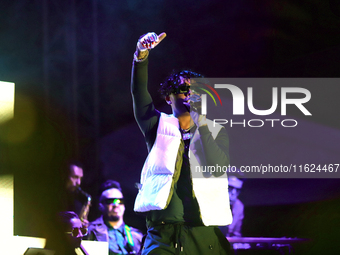 Rapper Erick Raul Aleman Ramirez, known as 'Aleman,' performs during the ''Hasta Siempre Presidente Fest'' at the Monumento to the Revolutio...