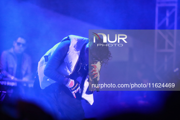 Rapper Erick Raul Aleman Ramirez, known as 'Aleman,' performs during the ''Hasta Siempre Presidente Fest'' at the Monumento to the Revolutio...