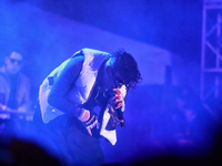 Rapper Erick Raul Aleman Ramirez, known as 'Aleman,' performs during the ''Hasta Siempre Presidente Fest'' at the Monumento to the Revolutio...