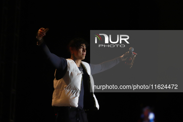 Rapper Erick Raul Aleman Ramirez, known as 'Aleman,' performs during the ''Hasta Siempre Presidente Fest'' at the Monumento to the Revolutio...