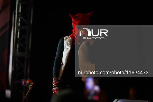 Rapper Erick Raul Aleman Ramirez, known as 'Aleman,' performs during the ''Hasta Siempre Presidente Fest'' at the Monumento to the Revolutio...