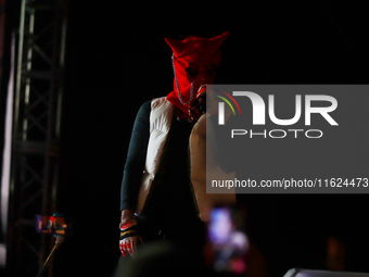 Rapper Erick Raul Aleman Ramirez, known as 'Aleman,' performs during the ''Hasta Siempre Presidente Fest'' at the Monumento to the Revolutio...