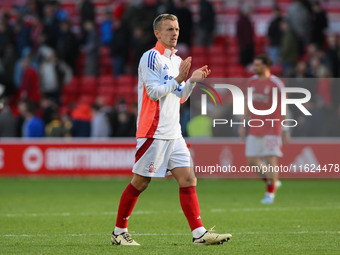 James Ward-Prowse of Nottingham Forest applauds his team's supporters during the Premier League match between Nottingham Forest and Fulham a...