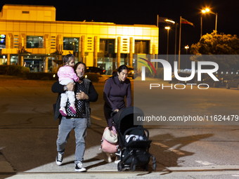 Relatives welcome their loved ones from Lebanon at Sofia Airport in Sofia, Bulgaria, on September 30, 2024. Due to the escalation of tension...