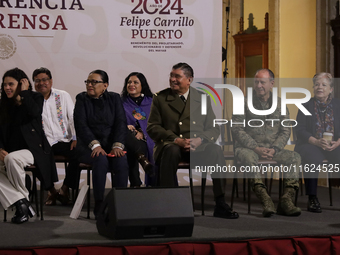 The cabinet of Andres Manuel Lopez Obrador, President of Mexico, accompanies him during his last press conference at the National Palace in...