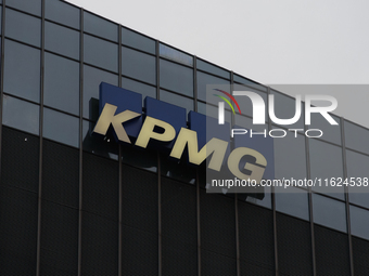 British multinational professional services network KPMG signage is pictured in Warsaw, Poland on September 28, 2024. (