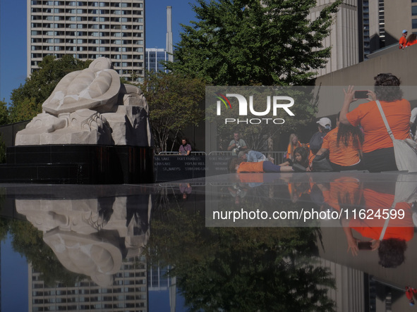 Visitors gather at the newly inaugurated Spirit Garden to observe National Day for Truth and Reconciliation in Toronto, Canada, on September...