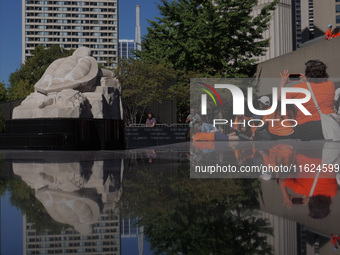 Visitors gather at the newly inaugurated Spirit Garden to observe National Day for Truth and Reconciliation in Toronto, Canada, on September...