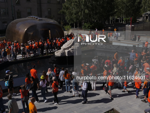 Visitors gather at the newly inaugurated Spirit Garden to observe National Day for Truth and Reconciliation in Toronto, Canada, on September...