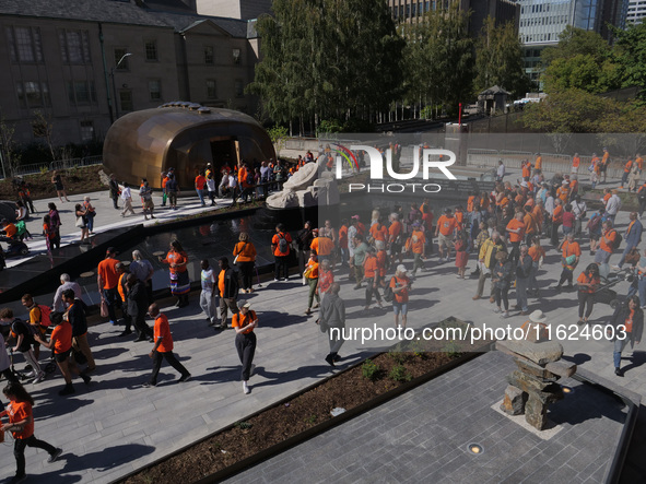 Visitors gather at the newly inaugurated Spirit Garden to observe National Day for Truth and Reconciliation in Toronto, Canada, on September...