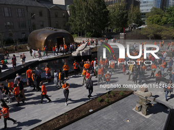 Visitors gather at the newly inaugurated Spirit Garden to observe National Day for Truth and Reconciliation in Toronto, Canada, on September...