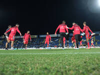 US Cremonese warms up for the Italian Serie B soccer championship match between Brescia Calcio FC and US Cremonese at Mario Rigamonti Stadiu...