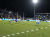 Brescia Calcio FC warms up for the Italian Serie B soccer championship match against US Cremonese at Mario Rigamonti Stadium in Brixia, Ital...