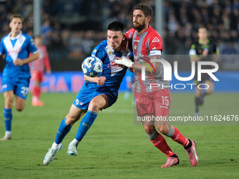 Ante Matteo Juric of Brescia Calcio FC contrasts with Matteo Biachetti of US Cremonese during the Italian Serie B soccer championship match...