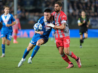 Ante Matteo Juric of Brescia Calcio FC contrasts with Matteo Biachetti of US Cremonese during the Italian Serie B soccer championship match...