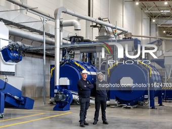 Men work in a newly opened plastic recycle plant in Krakow, Poland on September 30, 2024. The innovative plant will be able to recycle plast...