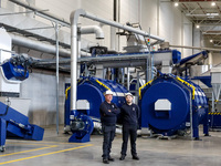 Men work in a newly opened plastic recycle plant in Krakow, Poland on September 30, 2024. The innovative plant will be able to recycle plast...