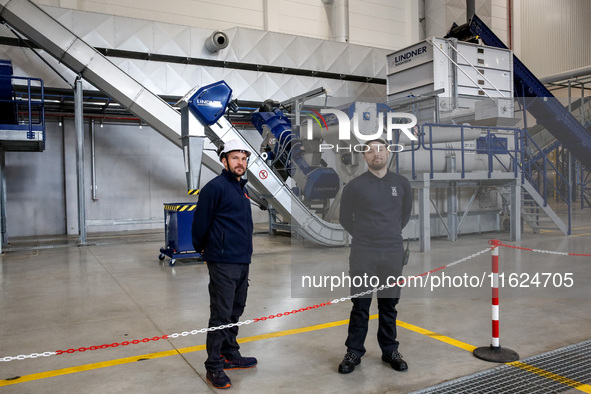 Men work in a newly opened plastic recycle plant in Krakow, Poland on September 30, 2024. The innovative plant will be able to recycle plast...