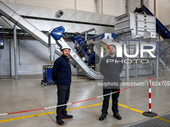 Men work in a newly opened plastic recycle plant in Krakow, Poland on September 30, 2024. The innovative plant will be able to recycle plast...