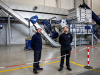 Men work in a newly opened plastic recycle plant in Krakow, Poland on September 30, 2024. The innovative plant will be able to recycle plast...