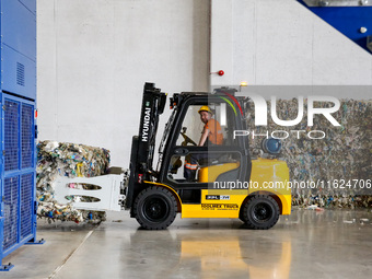 A man works in newly opened plastic recycle plant in Krakow, Poland on September 30, 2024. The innovative plant will be able to recycle plas...