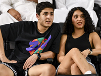 Fans of Esteghlal FC cheer for their team during the AFC Champions League elite west football match between Qatar's Al Sadd SC and Iran's Es...