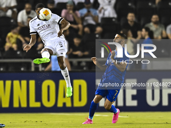 Pedro Miguel Correia of Al Sadd SC battles for the ball with Mehrdad Mohammadi of Esteghlal FC during the AFC Champions League elite west fo...