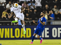 Pedro Miguel Correia of Al Sadd SC battles for the ball with Mehrdad Mohammadi of Esteghlal FC during the AFC Champions League elite west fo...