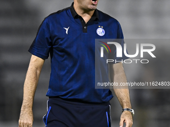 Esteghlal FC Head Coach, Javad Nekounam, reacts during the AFC Champions League elite west football match between Qatar's Al Sadd SC and Ira...