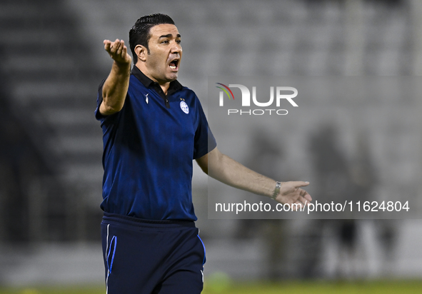 Esteghlal FC Head Coach, Javad Nekounam, reacts during the AFC Champions League elite west football match between Qatar's Al Sadd SC and Ira...