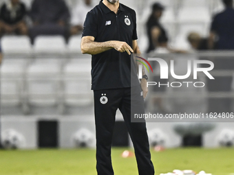 Al Sadd FC Head Coach Felix Sanchez Bas reacts during the AFC Champions League elite west football match between Qatar's Al Sadd SC and Iran...